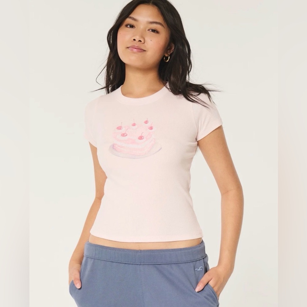 Hollister Women's Ribbed Longer Length Heart Cake Graphic Baby Tee Size XL